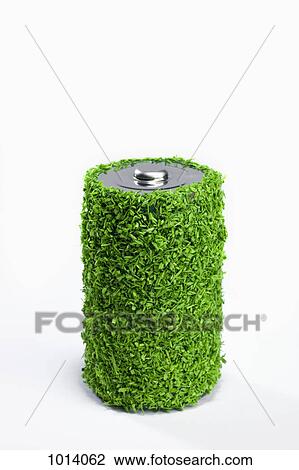 Stock Image - Energy saving battery covered in green grass. Fotosearch