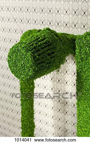 Energy saving home radiator covered in green grass. View Large Photo Image Stock Image - Energy saving home radiator covered in green grass.. Fotosearch