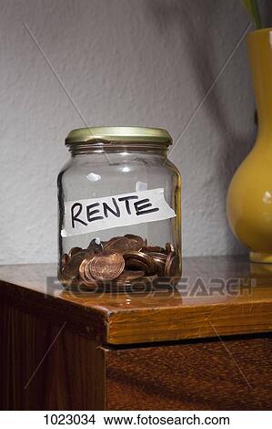 European Union coins in a jar labeled RENTE, the German word for PENSION View Large Photo Image Picture - European Union coins in a jar labeled RENTE, the German word for PENSION. Fotosearch