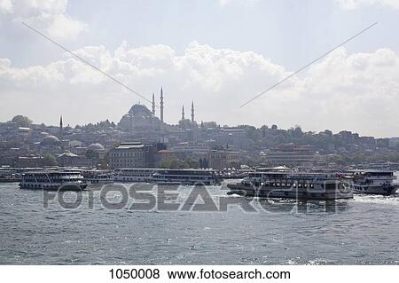 Ferries and tour boats on the Golden Horn River below the Suleymaniye Mosque, Istanbul, Turkey View Large Photo Image Stock Photo - Ferries and tour boats on the Golden Horn River below the Suleymaniye Mosque, Istanbul, Turkey. Fotosearch
