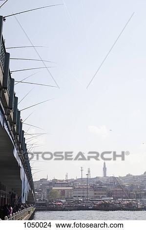 Fishing poles off the Galata Bridge, Istanbul, Turkey View Large Photo Image Picture - Fishing poles off the Galata Bridge, Istanbul, Turkey. Fotosearch