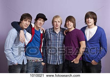 Five teenage boys, portrait, studio shot View Large Photo Image Stock Image - Five teenage boys, portrait, studio shot. Fotosearch