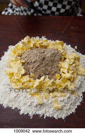 Flour, butter, and ground nuts on a kitchen bench View Large Photo Image Stock Image - Flour, butter, and ground nuts on a kitchen bench. Fotosearch