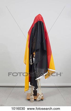 German flag draped over skeleton. View Large Photo Image Stock Image - German flag draped over skeleton.. Fotosearch