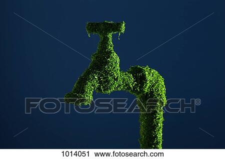 Stock Image - Green energy water tap covered in grass. Fotosearch