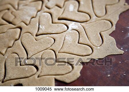 Heart shape cookies in dough View Large Photo Image Stock Photography - Heart shape cookies in dough. Fotosearch