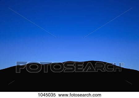 Stock Photography - Hills at dusk. Fotosearch