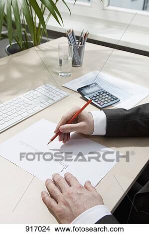 Invoice totaling View Large Photo Image Picture - Invoice totaling. Fotosearch