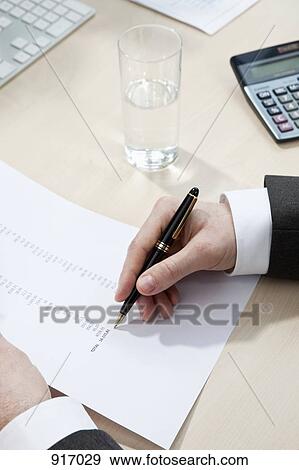 Invoice totaling View Large Photo Image Stock Photo - Invoice totaling. Fotosearch