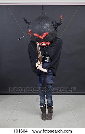 Kid with Halloween outfit and pistol. View Large Photo Image Stock Image - Kid with Halloween outfit and pistol.. Fotosearch