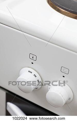 Knobs on a stove View Large Photo Image Picture - Knobs on a stove. Fotosearch