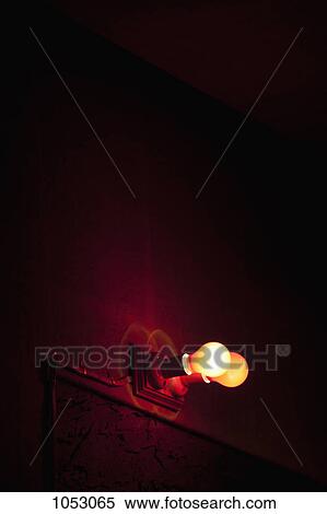 Lights bulbs illuminated on a wall View Large Photo Image Stock Photography - Lights bulbs illuminated on a wall. Fotosearch