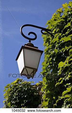 Low angle view of a street lamp View Large Photo Image Stock Image - Low angle view of a street lamp. Fotosearch