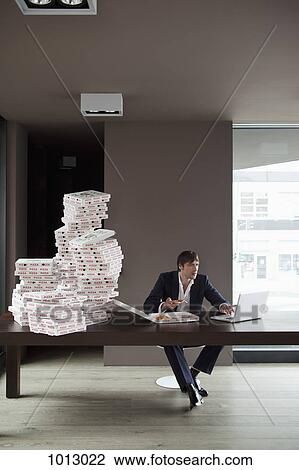 Many pizzas for businessman at home on laptop. View Large Photo Image Stock Image - Many pizzas for businessman at home on laptop.. Fotosearch