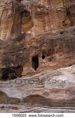 Middle East, Jordan, Petra, exterior view of cave on cliff side and sculpted steps View Large Photo Image Stock Photography - Middle East, Jordan, Petra, exterior view of cave on cliff side and sculpted steps. Fotosearch