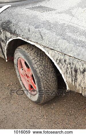 Stock Photo - Muddy sports car.. Fotosearch