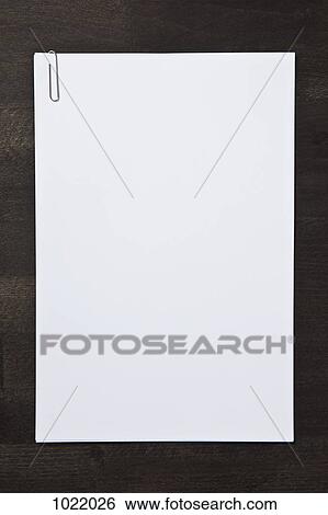 Paper clipped blank paper View Large Photo Image Stock Photograph - Paper clipped blank paper. Fotosearch