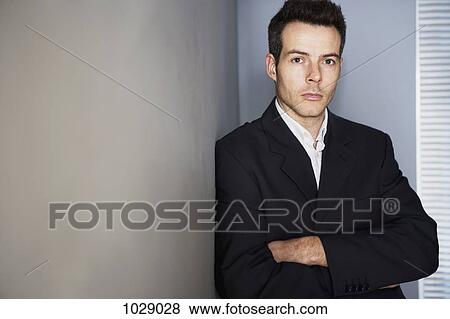Portrait of a businessman with arms crossed, waist up View Large Photo Image Stock Photo - Portrait of a businessman with arms crossed, waist up. Fotosearch