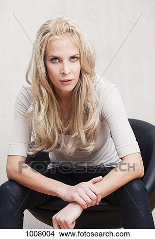 Portrait of a young woman View Large Photo Image Picture - Portrait of a young woman. Fotosearch