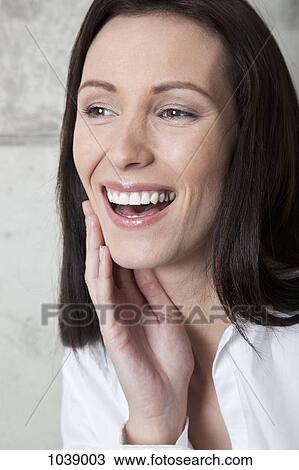 Portrait of a young woman View Large Photo Image Stock Image - Portrait of a young woman. Fotosearch