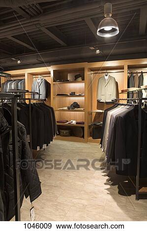 Racks of suits in a menswear store View Large Photo Image Stock Photo - Racks of suits in a menswear store. Fotosearch