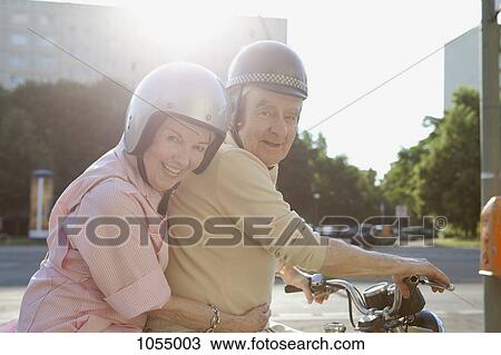 Senior couple happy on motorbike View Large Photo Image Stock Image - Senior couple happy on motorbike. Fotosearch