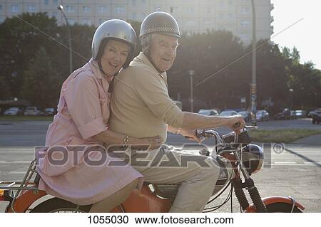 Senior couple happy on motorbike View Large Photo Image Stock Image - Senior couple happy on motorbike. Fotosearch