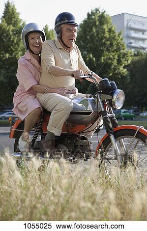 Senior couple happy on motorbike View Large Photo Image Stock Photography - Senior couple happy on motorbike. Fotosearch