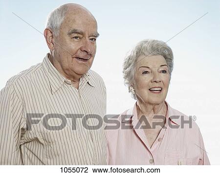 Senior couple look into distance View Large Photo Image Stock Image - Senior couple look into distance. Fotosearch