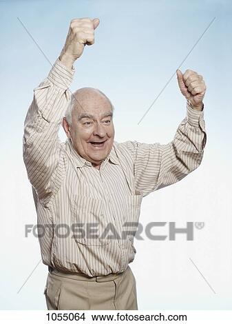 Senior man cheering View Large Photo Image Picture - Senior man cheering. Fotosearch