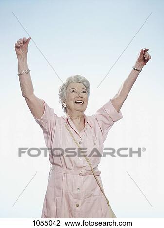 Senior woman cheering View Large Photo Image Stock Image - Senior woman cheering. Fotosearch