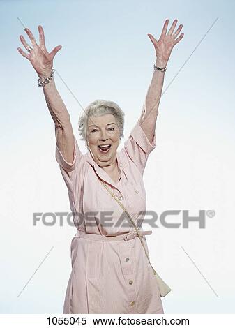 Senior woman cheering View Large Photo Image Stock Photography - Senior woman cheering. Fotosearch