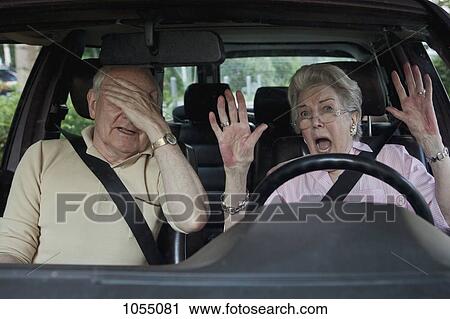 Senior woman having trouble learning to drive as man in passenger seat despairs View Large Photo Image Stock Image - Senior woman having trouble learning to drive as man in passenger seat despairs. Fotosearch