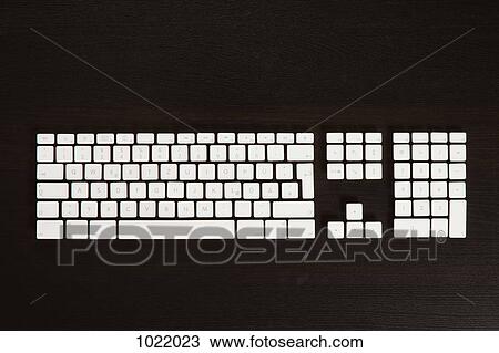 Separate computer keys arranged to look like an actual keyboard View Large Photo Image Stock Image - Separate computer keys arranged to look like an actual keyboard. Fotosearch