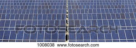 Solar panels in a field View Large Photo Image Stock Photo - Solar panels in a field. Fotosearch