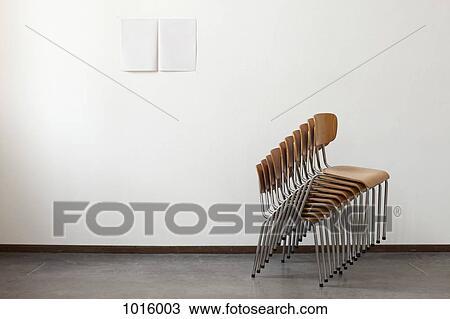 Stack of chairs. View Large Photo Image Stock Image - Stack of chairs.. Fotosearch