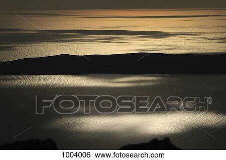 Sunrise on the Adriatic Sea near Unije, Croatia View Large Photo Image Stock Photograph - Sunrise on the Adriatic Sea near Unije, Croatia. Fotosearch