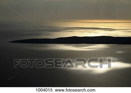Sunrise on the Adriatic Sea near Unije, Croatia View Large Photo Image Stock Photography - Sunrise on the Adriatic Sea near Unije, Croatia. Fotosearch