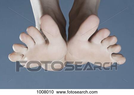 The feet of a woman View Large Photo Image Stock Image - The feet of a woman. Fotosearch
