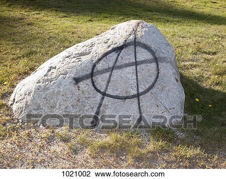 The well-known anarchy symbol Circle-A spray painted on a rock View Large Photo Image Stock Image - The well-known anarchy symbol Circle-A spray painted on a rock. Fotosearch