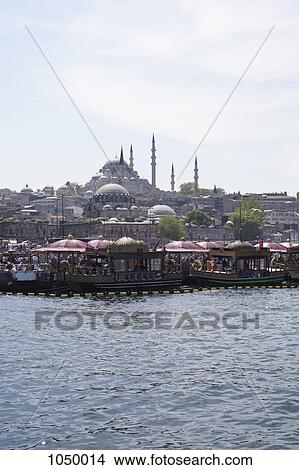 Tour boats on the Golden Horn River below the Suleymaniye Mosque, Istanbul, Turkey View Large Photo Image Picture - Tour boats on the Golden Horn River below the Suleymaniye Mosque, Istanbul, Turkey. Fotosearch
