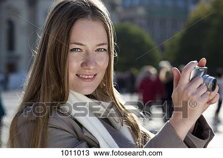 Tourist woman with camera View Large Photo Image Stock Image - Tourist woman with camera . Fotosearch