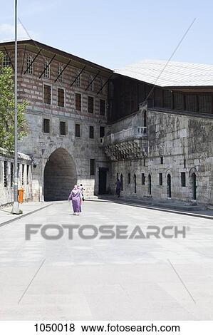 Tourists outside The New Mosque, or Yeni Cami Mosque, Istanbul, Turkey View Large Photo Image Stock Photo - Tourists outside The New Mosque, or Yeni Cami Mosque, Istanbul, Turkey. Fotosearch