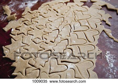 Various shaped cookies in dough View Large Photo Image Stock Photography - Various shaped cookies in dough. Fotosearch