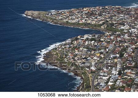 View of a coastal town View Large Photo Image Stock Photo - View of a coastal town. Fotosearch