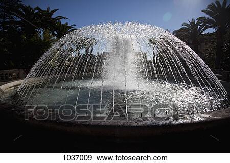 Stock Photo - Water fountain outside Monaco Casino. Fotosearch