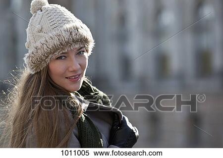 Woman turns around for pose View Large Photo Image Stock Photography - Woman turns around for pose. Fotosearch