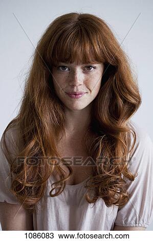 A beautiful young red haired woman, portrait View Large Photo Image Stock Image - A beautiful young red haired woman, portrait. Fotosearch