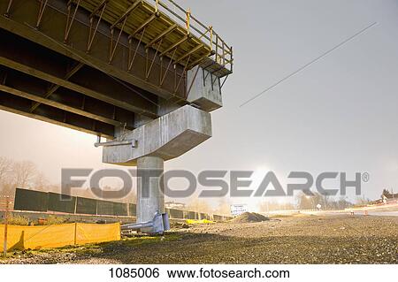 Stock Photograph - A freeway over pass under construction. Fotosearch