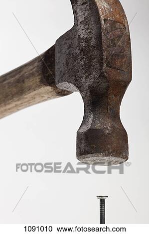A hammer and nail View Large Photo Image Stock Image - A hammer and nail. Fotosearch